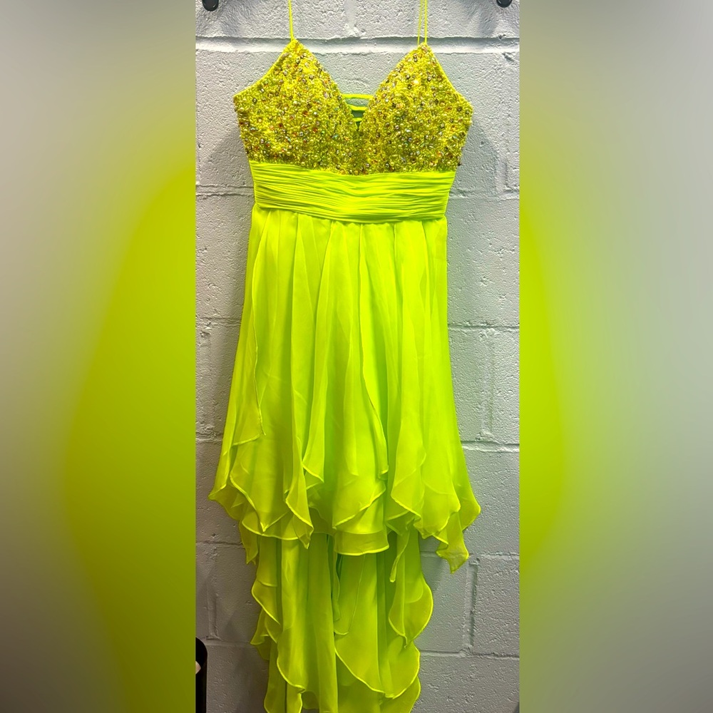 High low cocktail dress. Beaded top elegant flow bottom.